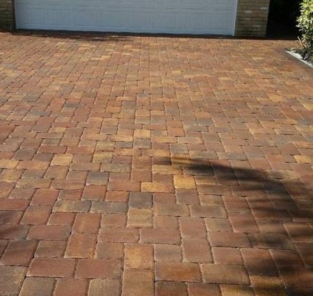 This is a driveway done in Spring 2019. This project was done by one of our driveway pavers in Brooklyn NYC. It has a mix of brown colors in the design.