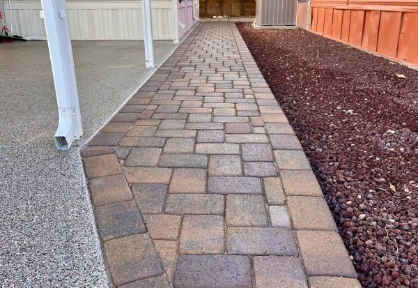 This is a walkway pavers project done for one of our customers. The color is a mix of shades of brown. This image was taken in 2017.